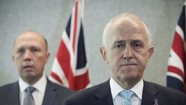 Prime Minister Malcolm Turnbull, flanked by potential leadership rival, the Home Affairs Minister Peter Dutton.