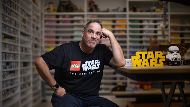 Ryan McNaught in his Tullamarine warehouse where boxes of carefully sorted Lego line every wall 
