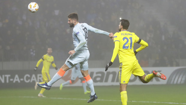 Chelsea's Oliver Giroud heads the ball in the Europa League match against BATE Borisov.