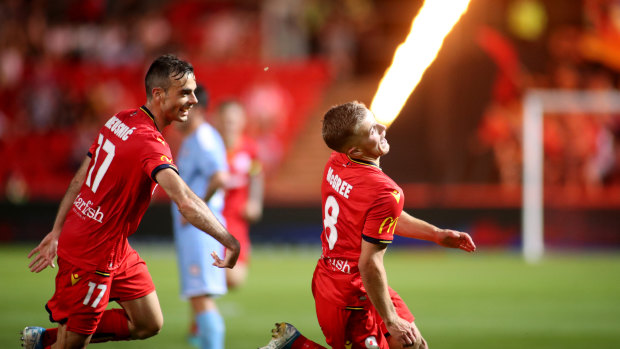 Firing home: Riley McGree lights up after scoring in the FFA Cup final for Adelaide.