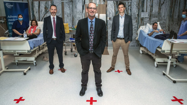 Professors Trent Munro and Keith Chappell with Professor Paul Young (centre),  who co-leads the team at the University of Queensland producing what looks like Australia’s leading candidate for a coronavirus vaccine.