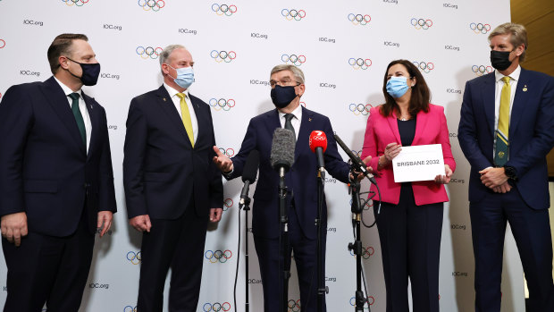 President of the International Olympic Committee Thomas Bach, centre, with members of the Brisbane 2032 delegation. From left, Lord Mayor of Brisbane Adrian Schrinner, federal minister for sport Richard Colbeck, Queensland Premier Annastacia Palaszczuk and three-time Olympic gold medallist James Tomkins.