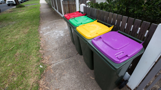 The new purple-top bin will be for glass recycling.