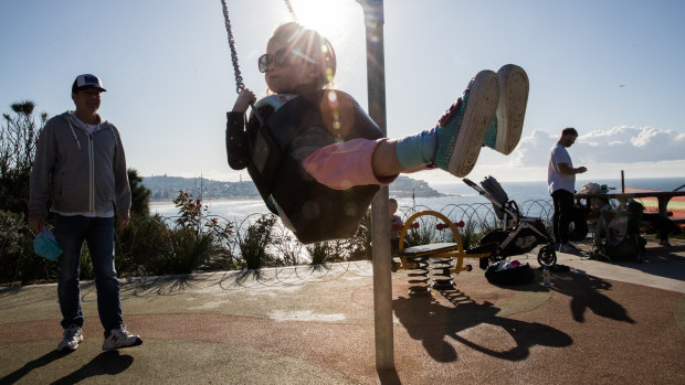 A child enjoys the swings at Marks Park as coronavirus lockdown restrictions were eased over the weekend.  Photo: Edwina Pickles