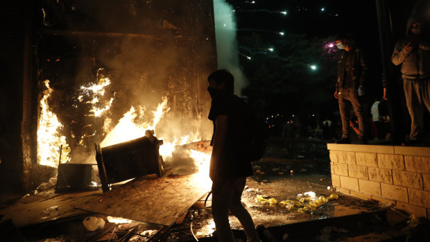 Protesters set fires at the third precinct station of the Minneapolis Police Department.