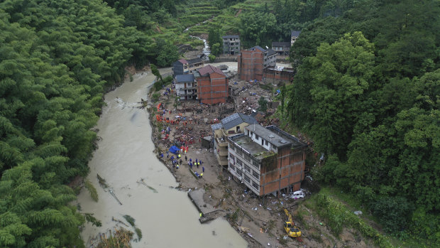 Rescuers search for victims of a landslide triggered by Typhoon Lekima in Yongjia county in eastern China's Zhejiang province.