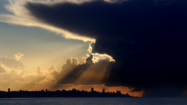 A cloud is shown at sunset over Beirut, Lebanon.