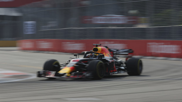 Fastest: Daniel Ricciardo steers his car during first practice at the Marina Bay City Circuit.