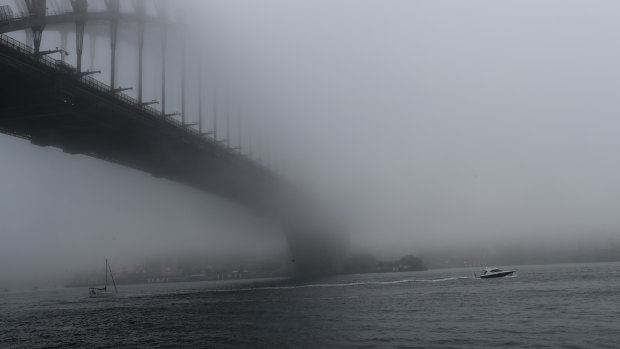 Fog around the Sydney Harbour Bridge.
