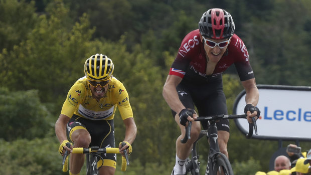 Grunt: Geraint Thomas powers away from leader Julian Alaphilippe in the stage six finale.