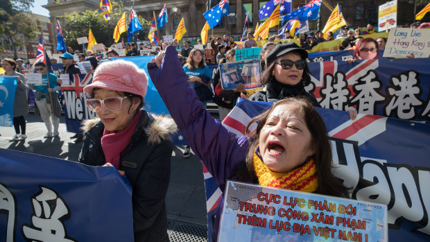 Groups gather in front of the State Library of Victoria on Saturday in support of Hong Kong democracy protesters.