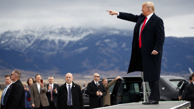 President Donald Trump arrives for a campaign rally at Bozeman Yellowstone International Airport.