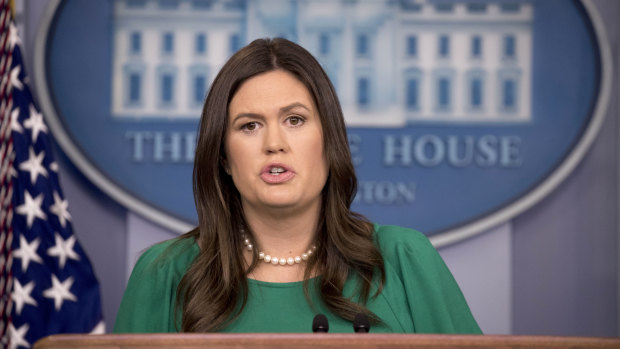 White House press secretary Sarah Huckabee Sanders speaks to the media during a daily press briefing at the White House last October. Now her boss has said she shouldn't bother.