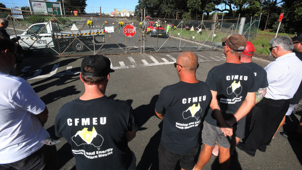 Locked-out Port Kembla Coal Terminal union workers paid tribute to their colleague.