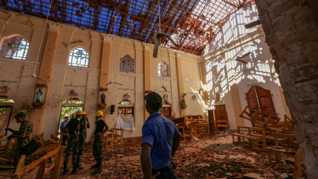 Soldiers inspect the damage inside St Sebastian's Church in Negombo, Sri Lanka.