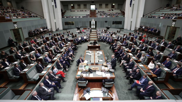 The House of Reps listens during Mr Morrison's address.