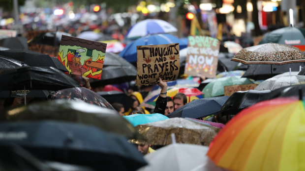 Climate change protesters marched through Melbourne, in defiance of a police request to postpone the rally. 