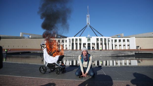 Extinction Rebellion protest at Parliament House in Canberra on Tuesday, following the release of the United Nations’ Intergovernmental Panel on Climate Change report on Monday. 
