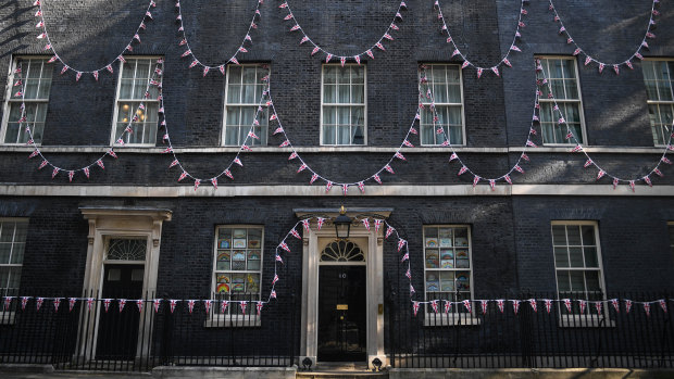 Union Jack bunting was strung across the front of Number 10 Downing Street.