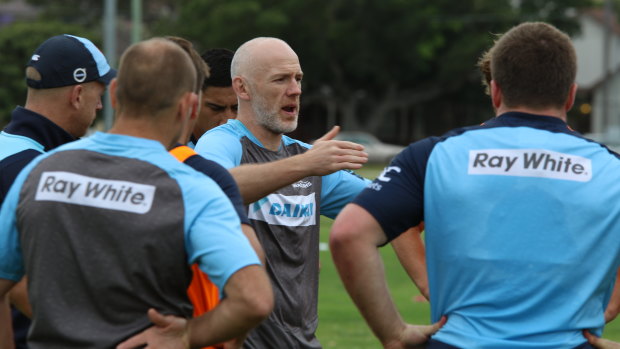 Former Ospreys flanker Steve Tandy has joined the Waratahs as defence coach on a two-year deal.