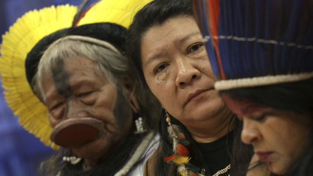 Kayapo tribe leader Raoni Metuktire, from left, Joenia Wapichana, the first Brazilian indigenous MP, and indigenous leader Sonia Guajajara meet with MPs earlier this year, to discuss land rights.