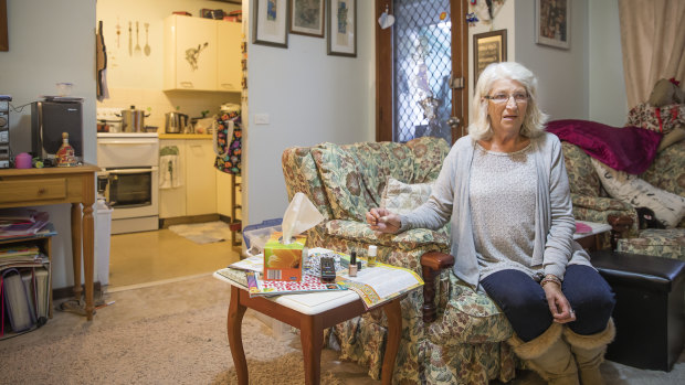 Trish Casey inside her Belconnen public housing unit. She has had repeated issues with maintenance over the years. 