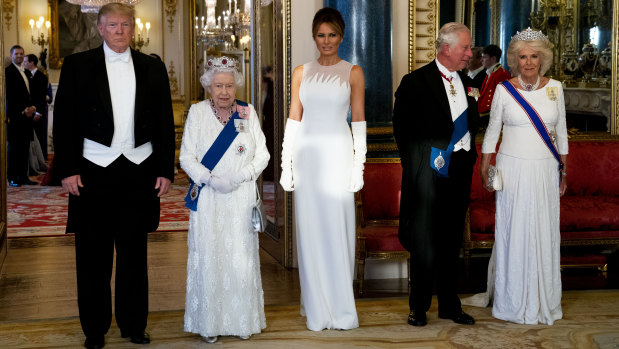 From left, President Donald Trump, Queen Elizabeth II, US first lady Melania Trump, Prince Charles and Camilla, the Duchess of Cornwall, pose for the media ahead of the State Banquet.