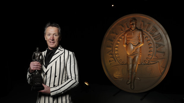 Craig Bellamy accepts the Dally M coach of the year award last October.