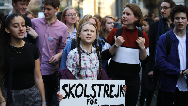 Swedish teenager Greta Thunberg leading a march of thousands of French students through Paris in February.