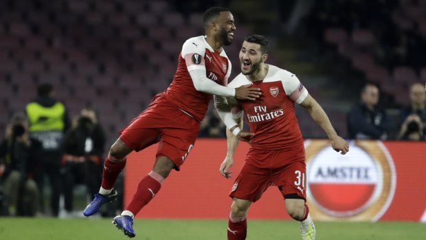 Arsenal's Alexandre Lacazette (left) celebrates his goal with teammate Sead Kolasinac.