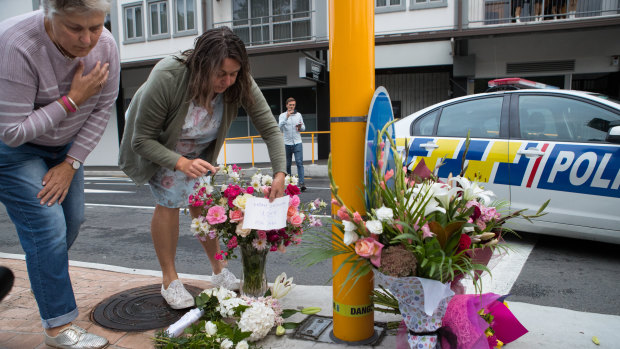 'Home grown love for all': Locals lay flowers near the Al Noor Mosque in Christchurch on Saturday morning.