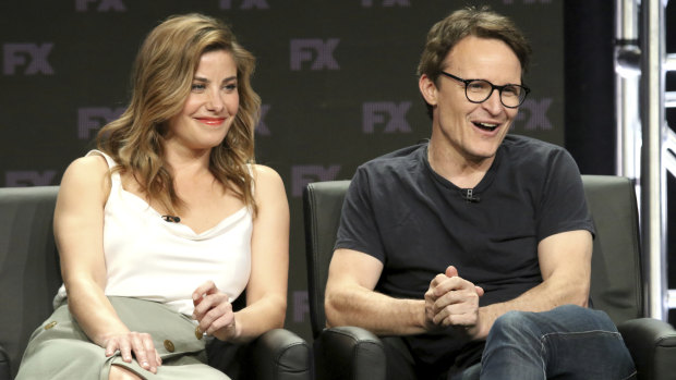 Damon Herriman (right) with Mr Inbetween co-star Brooke Satchwell at a press event in Los Angeles.