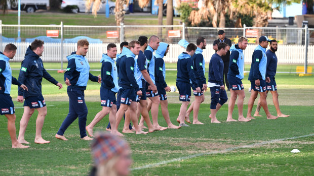 Barefoot Blues: NSW players train sans footwear at Coogee Oval on Monday.