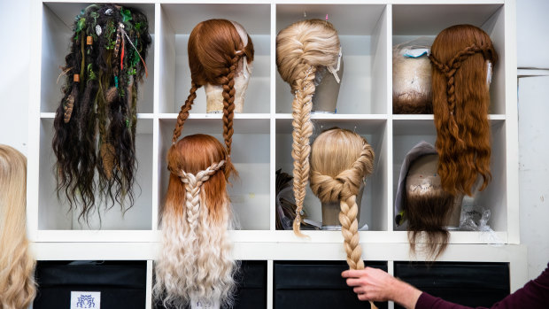 A collection of wigs and beards ready to go for Frozen the Musical.