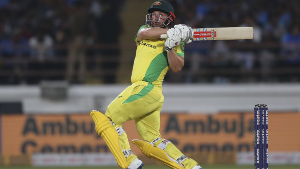 Aaron Finch goes over the top against India.