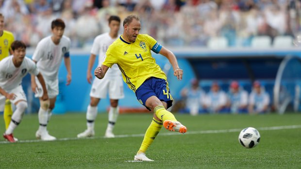 Sweden's Andreas Granqvist makes no mistake with his spot-kick.