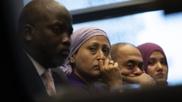 Representatives of the Rohingya community and The Gambia's Justice Minister Aboubacarr Tambadou, left, listen to testimony during a press conference in The Hague.