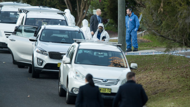 Police at the West Pennant Hills property where the two teenagers were killed. 