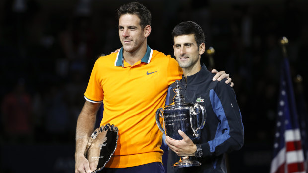 Celebration: He will improve to No.3 in the rankings, but there is little doubt Novak Djokovic (right) is back on top.