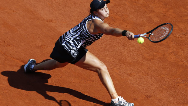 Barty stretches for the ball during the final of the French Open.