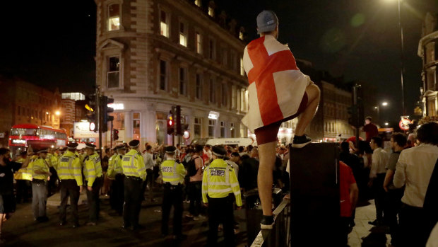 It's coming home: England fans celebrate in the street near London Bridge station.