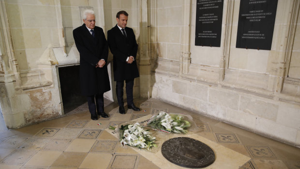 French President Emmanuel Macron and Italian President Sergio Mattarella pay their respects at the tomb of Leonardo da Vinci at St Hubert Chapel in Chateau d'Amboise.