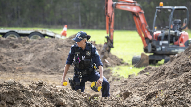 Land set aside for a cemetery in outer Brisbane was combed by police after Edmund Riggs finally told them where to look for the last of his wife's remains.