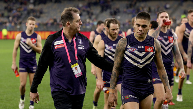 Digging in: Fremantle coach Ross Lyon with Dockers star Michael Walter.