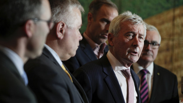 Bernard Collaery, flanked by Senators Tim Storer, Rex Patrick, Nick McKim and Andrew Wilkie, addresses the media during a press conference on the East Timor spy scandal