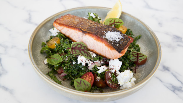  Z.I.A Kitchen's crisp-skinned salmon fillet with "kabbouli" salad, where kale leaves stand in for parsley. 