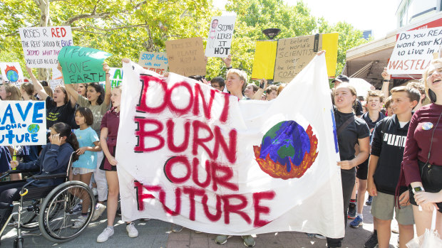 Canberra school students strike from school to protest Adani's coal mine and government inaction on climate chang