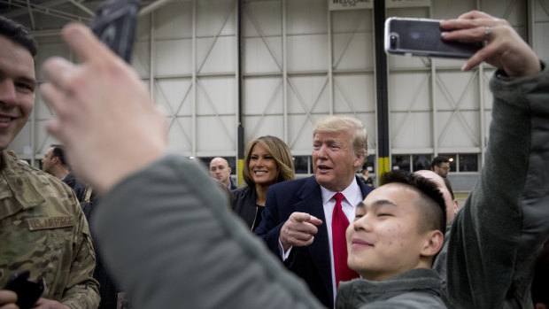 President Donald Trump and first lady Melania Trump greet members of the military at Ramstein Air Base in Germany.