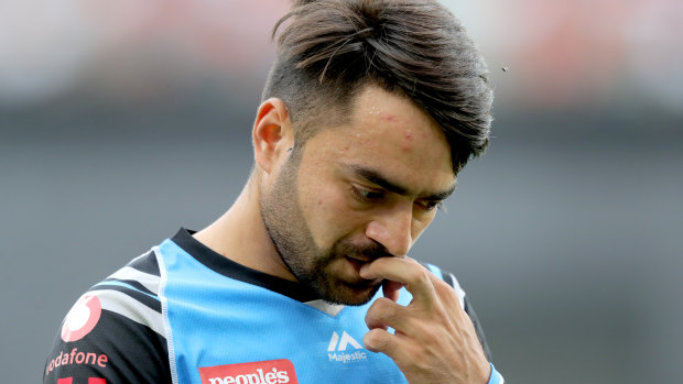Grieving: Rashid Khan has stayed in Australia despite the recent death of his father.