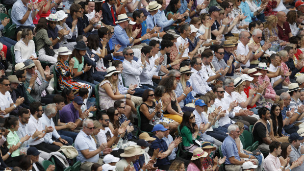 A full capacity crowd watches the men’s singles final between Serbia’s Novak Djokovic and Italy’s Matteo Berrettini at Wimbledon.